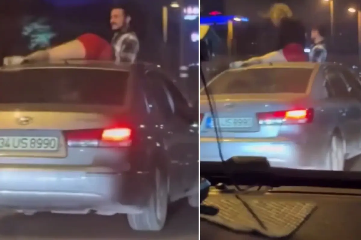 Seyir halindeki otomobilin tavanında twerk yapmaya çalıştı